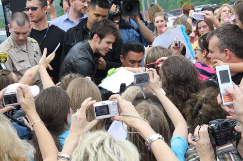 pages_10-11_-_kris_allen_is_surrounded_by_fans_gathered_in_little_rock.jpg
