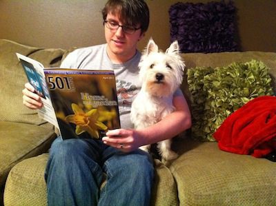 Levi and his dog, Faraday, read up on some "Home and garden" tips.