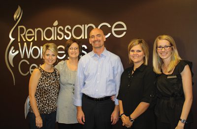 Dr. Michael Wood (center) with employees Tracy Clifft, Lameta McMillen, Lori Davis, and I’Lisa Williams.