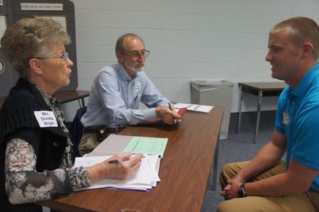 Interviewers Doretta Bright (from left) and Hervey Galloway with Chance Lefler, student teacher.