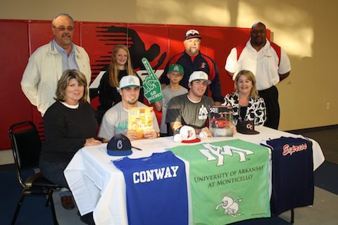 Surrounded by family and friends, Alex and Jake donned UAM caps after committing to play for the UAM Boll Weevils.