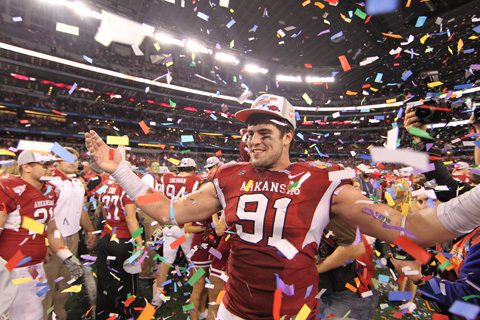 Jake Bequette – who played for Little Rock Catholic High School – celebrates the Arkansas Razorback win in the Cotton Bowl. (Bill Patterson photo)