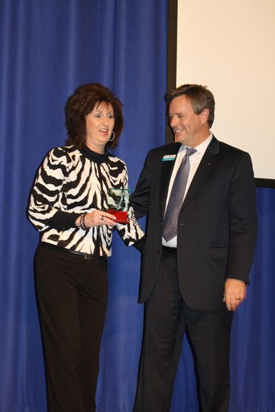 Johnny Adams (right) presents the Citizen of the Year award to Shawn Johnston at the 2011 Greenbrier Chamber of Commerce banquet and annual meeting. 