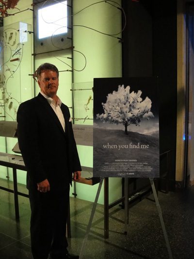 Kelly Shipp with the movie poster that features his winning photo