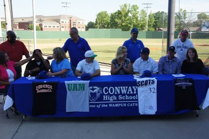 Family and friends attended the signing ceremony – Karen and Terry Crenshaw, parents of Zach Crenshaw; Kay and Jay Smith, parents of Alex Smith; Beth and John Fluesmeier, parents of Colin Fluesmeier; and Tammy and David Langley, parents of Tyler Langley. (Blake Farris photo)