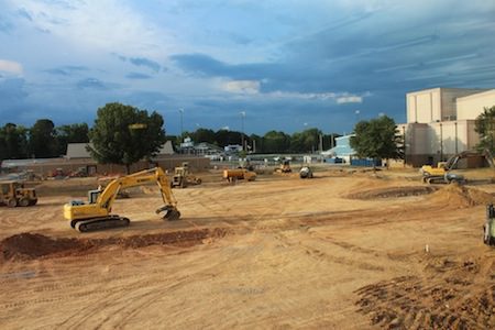 The view of the space where a courtyard will be placed and where the former high school stood.