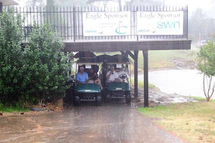 Golfers encountered a short rain delay.