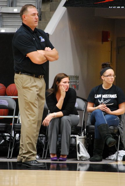 CBC coach Lyle Middleton (standing) at recent game. (Lee Hogan photo)