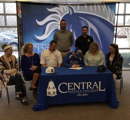 Surrounded by friends and family — Bonnie McEntire (mother), Kelsey McEntire (sister), Mark McEntire (father) and Carie McEntire (stepmom) — Keeton McEntire signed his letter of intent to play baseball at Central Baptist College. 