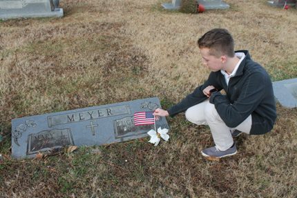 Sophomore Ian Martin at the gravesite of Eugene Meyer.