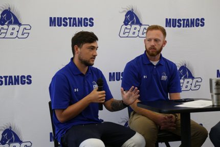 Player Josh Reed and CBC Soccer Coach Taylor Carnahan.