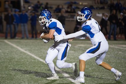 Junior running back Spencer Sutterfield (left) and senior quarterback Carter Burcham. 