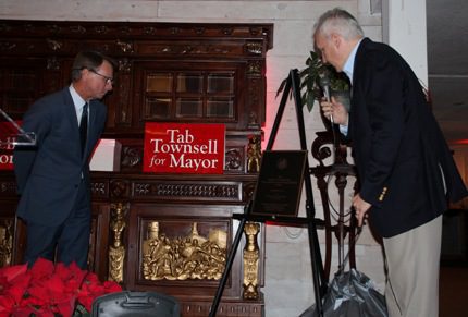 Conway alderman David Grimes (right) announces the establishment of a scholarship at the University of Central Arkansas in honor of Conway Mayor Tab Townsell, who will leave office at the end of the year.