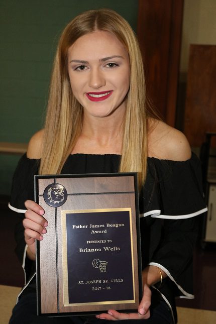 St. Joseph’s Brianna Wells received the Father James Beagan Award, the top award for a senior girl on the school basketball team.